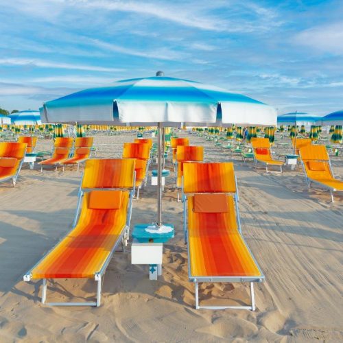 blue-umbrellas-chaise-lounges-beach-rimini-italy