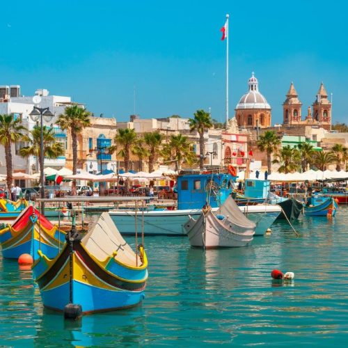 traditional-eyed-colorful-boats-luzzu-harbor-mediterranean-fishing-village-marsaxlokk-malta
