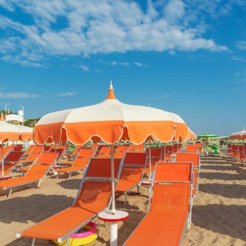 umbrellas-chaise-lounges-beach-rimini-italy