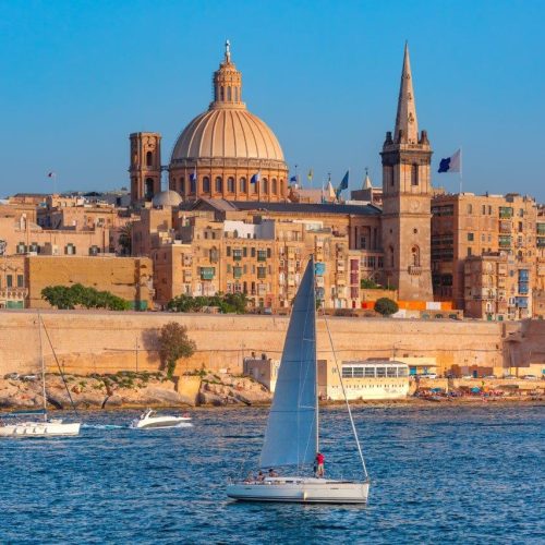 white-yacht-old-town-valletta-with-churches-our-lady-mount-carmel-st-paul-s-anglican-pro-cathedral-valletta-capital-city-malta-1