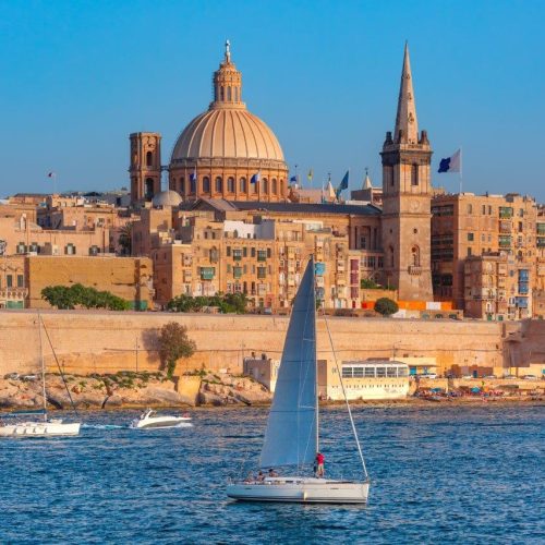 white-yacht-old-town-valletta-with-churches-our-lady-mount-carmel-st-paul-s-anglican-pro-cathedral-valletta-capital-city-malta